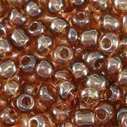 Glasperlen rocailles 6/0 (4mm) Transparent brown